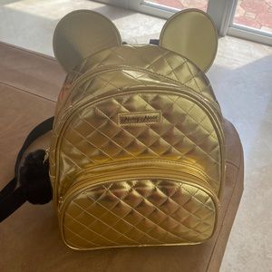 Gold Mickey Mouse backpack
